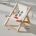 Mini wooden folding chair phone holder with white canvas and red fruit pattern design - Peace and Joy