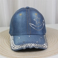 Detailed view of rhinestone moon and stars patterns on washed blue denim baseball cap - No.2-Star Moon Studded-Blue