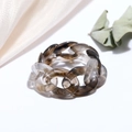 Detail of chunky resin chain ring with amber brown and smoky grey translucent link texture - Black Brown