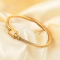 Brazalete de acero inoxidable chapado en oro de 18K con hebilla de herradura y cable - Dorado