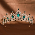 Elegant gold bridal tiara with green emerald gemstones and sparkling rhinestones on satin - Gold / Green