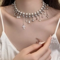 Chic multi-layered pearl necklace with silver cross and star pendants on a model - Gothic Star Cross Artificial Pearl Necklace (DX0369) / Silver Gray