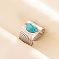 Close-up of bohemian adjustable steel ring with turquoise stone and radial texture - Silver-Light Blue