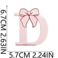 Pink embroidered letter D patch with bow detail and red border stitching, size 6.7x5.7cm - Pink Letter D