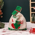Knitted Christmas gift bag with festive stocking pattern and Merry Christmas text in red - Green Christmas Sock Knit Handbag (Small)