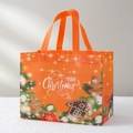 Orange Merry Christmas non-woven gift bag with holiday trees and gingerbread house patterns - Christmas Style 39