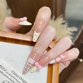 Pink almond press-on nails with 3D bows, hearts, and pearls in a minimalist sweet style - By1659 Shuimu Mingse / Glue Type