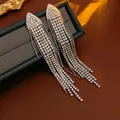 Elegant long tassel earrings with silver needles and white rhinestones in silver finish - Silver Tassel