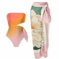 Detail of one-shoulder gradient bikini with side cut-out and floral beach sarong - Y22 Orange Yarn Skirt Set