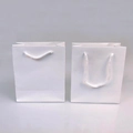 Minimalist white paper gift bags with woven rope handles for jewelry and accessories - White Simple Gift Bag with Rope Handle