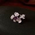 Macro detail of a silver ring featuring purple square zircon and floral butterfly motifs - 28# Ring - Silver - Purple Flower