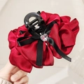 Ostrich feather hair claw clip featuring a red satin bow and black ribbon heart crystal - 13CM Red AB Side Bow Heart Claw Clip