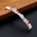 Close-up of a silver hair clip with colorful irregular natural crystal stones - Colorful Crackle Quartz with Silver Clip