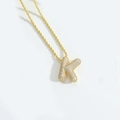 Chic gold-plated rope chain necklace featuring a pave-set cubic zirconia letter K pendant - Letter K