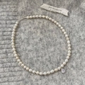 Detailed view of pearl necklace featuring water-drop zircon pendant and adjustable lobster clasp - Silver Drop Zirconia Pearl Necklace
