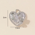 Detail of silver heart pendant with butterfly relief and cubic zirconia stones - 0228-21/Silver Butterfly Heart