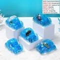Bouteille dérivante en acrylique en forme de voiture avec fluide bleu et voilier miniature - Coccinelle-Petit Bateau / Styles Aléatoires