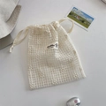Detailed close-up of white mesh lace drawstring bag with delicate daisy flower embroidery - Grid Style / Small (16x20cm)
