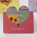 Pink heart-shaped 3D oil painting greeting card featuring roses and beach landscape - Ends of the Earth