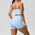 Detail of baby blue yoga set showing the criss-cross back and high-waist fitness shorts - Sky Blue