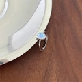 Adjustable 925 sterling silver ring with oval moonstone on metallic surface - Silver Blue Moonstone (JZ0175)