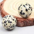 Polished Dalmatian Jasper crystal spheres on a natural wood base decoration - Dalmatian Jasper