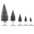 Five assorted miniature frosted Christmas trees with white snow tips and plastic bases - 7.5cm Deep Green