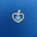 Golden heart pendant with evil eye design and blue crystals on dark blue background - Heart Shaped Blue Eye Gold Diamond Pendant (768)