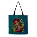 Close-up of canvas tote bag showing artistic moth and red floral pattern details - Teal Moth and Red Chrysanthemum Print (hm6667)