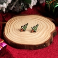 Cute green Christmas tree stud earrings with snow effect on red holiday background - Snowy Christmas Tree