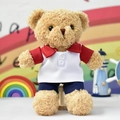Adorable brown teddy bear plush toy wearing red and white polo shirt and blue shorts - 30 cm / Red & White
