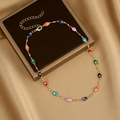 Detail of gold necklace with colorful enamel Evil Eye and Hamsa Hand charms on satin - 4# Gold Evil Eye Hamsa Hand Necklace