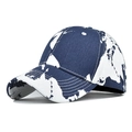 Detailed view of tie-dye baseball cap featuring a blue and white world map print pattern - Adjustable / Tie Dye Blue