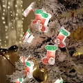Festive Christmas stocking LED string lights with Santa Claus design for tree decoration - Painted Christmas Stocking