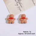Gingerbread man resin DIY accessory with red bow for holiday decor, 18x22mm size - Gingerbread Man with Bow