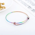 Macro detail of rainbow gradient stainless steel wire bracelet with adjustable sliding knot - Rainbow Color (KB163107)