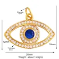 Golden Evil Eye charm pendant with sparkling white zircons and a deep blue crystal center - Champagne