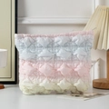 Detail of quilted gradient puffer cosmetic bag featuring a unique 3D bubble texture - Rainbow Color 2