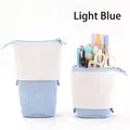 Light blue expandable canvas pencil case shown in both extended and standing pen holder modes - Corduroy - Blue