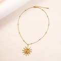 Gold stainless steel sun pendant necklace with elegant beaded chain on white background - Necklace-Gold(TN89) / Gold