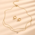 Elegant gold double-layered titanium necklace and six-prong diamond stud earring set - Gold