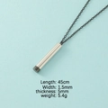 Silver stainless steel cylinder pendant necklace with black base on a light blue background - Steel Shell + Black Inner Column (MP382)