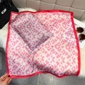 Elegant red and pink silk square scarf with geometric rings on soft white plush background - Rose
