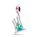 Detailed silver Sagrada Familia pendant with colorful enamel accents on white background - Barcelona Cathedral