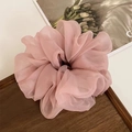 Pink sheer organza lace scrunchie for women on a rustic wooden tray for hair styling - Pink