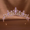 Close-up of golden bridal crown featuring purple rhinestones and crystal details - Purple