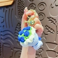 Handmade crochet blue flower bouquet keychain with golden clasp and small bell charm - Blue Rose