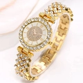 Detailed close-up of a women's luxury gold quartz watch featuring shimmering rhinestones - Gold Watch (Single)