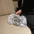 Detailed close-up of the silver rose-shaped satin evening clutch with metallic sphere clasp - Silver
