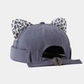 Detail of adjustable metal buckle and leopard ears on grey canvas docker cap - Adjustable / Fog Blue